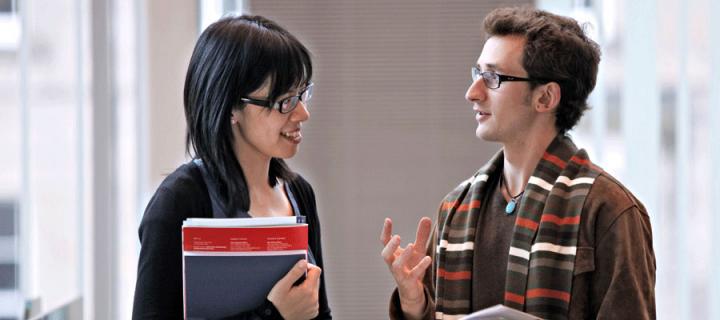 Photo of a student talking to Careers Service staff