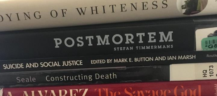 A pile of books about suicide