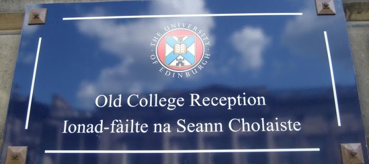 Bilingual sign outside Old College