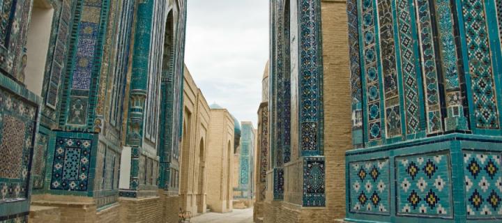 A blue tiled walled street in Uzbekistan
