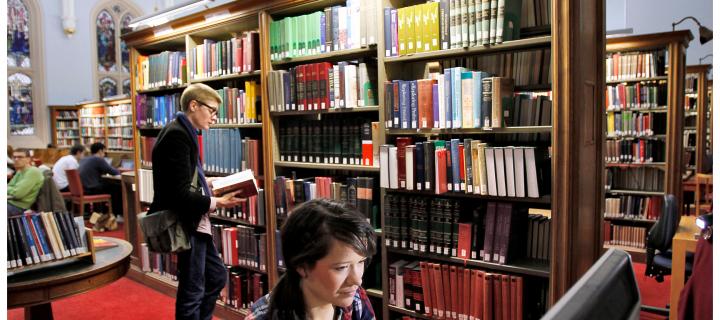 Students working in a library