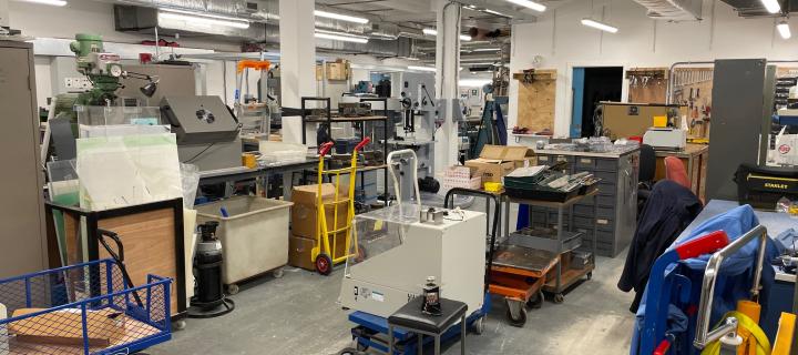 Photo of the workshop space, with losts of varied a equipment and tools