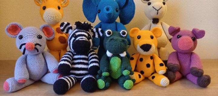 collection of knitted soft animals