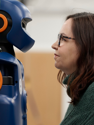 Prof Shannon Vallor nose-to-nose with robot