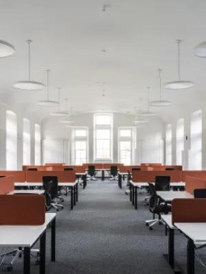 Desks and chairs in a room within Edinburgh Futures Institute