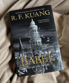 The Book "Babel" lying on a bed