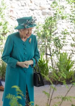 The Queen smiles as she visits ECCI in July 2021
