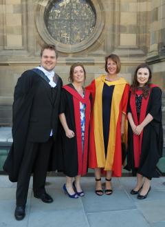 Professor Jayne hope with three of her successful postgrad students