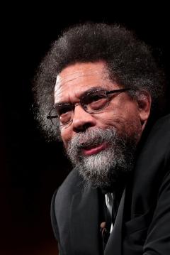Portrait of Dr Cornel West in dark suit