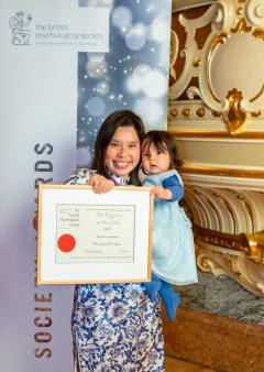 Dr Stella Chan and her daughter holding BPS award