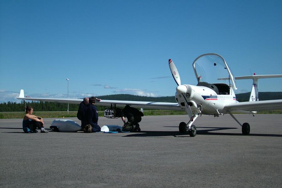 Crew prepare the ECO-Dimona's science package for flight at Kiruna airport, northern Sweden.