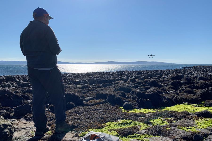 M300 drone and pilot on a beach in Skye