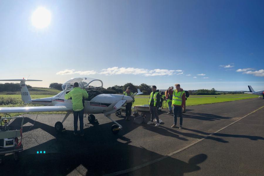 students visiting the Dimona aircraft at Fife airport