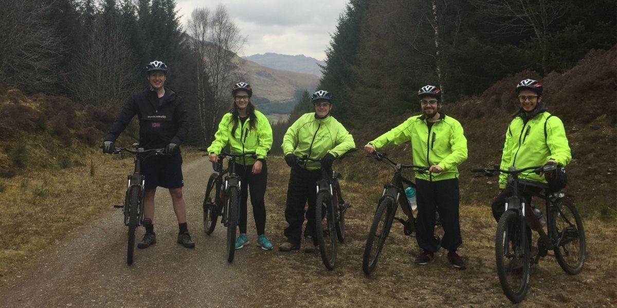 Group of people on mountain bikes