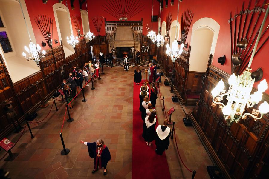 A high level wide shot of the great hall in the castle