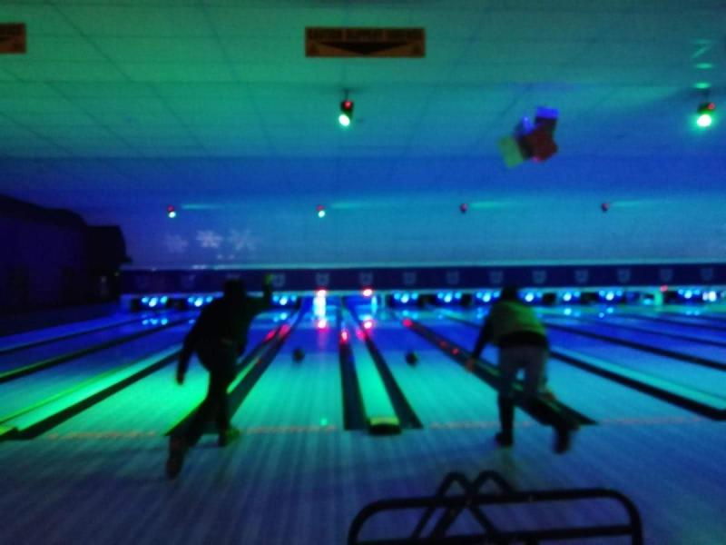 Photo of two group members bowling