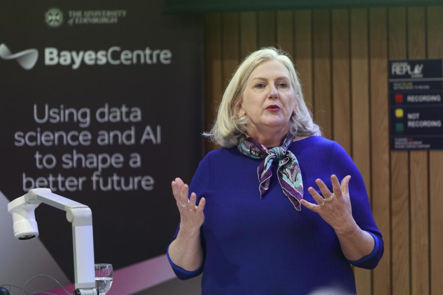 ICMS, Jane Walker, presents to audience in Bayes Centre