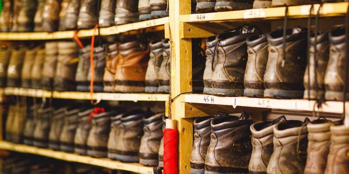 Rows of boots lined up in the store room at Firbush