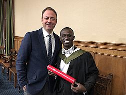 Dr Joshua Ralston with graduate Emmanuel Kwame Tettey 